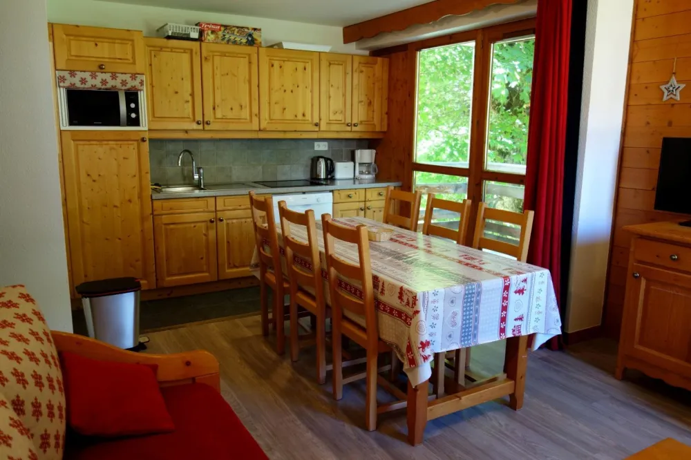 Coin cuisine et son balcon