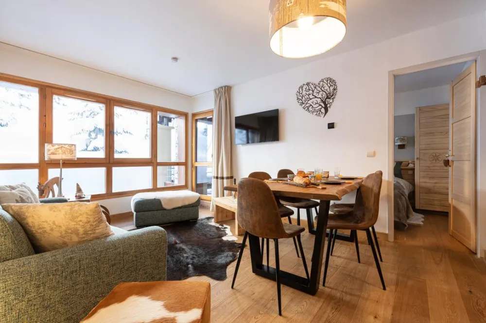 Appartement de charme en résidence 5* skis aux pieds avec piscine, jaccuzi, sauna, et hammam